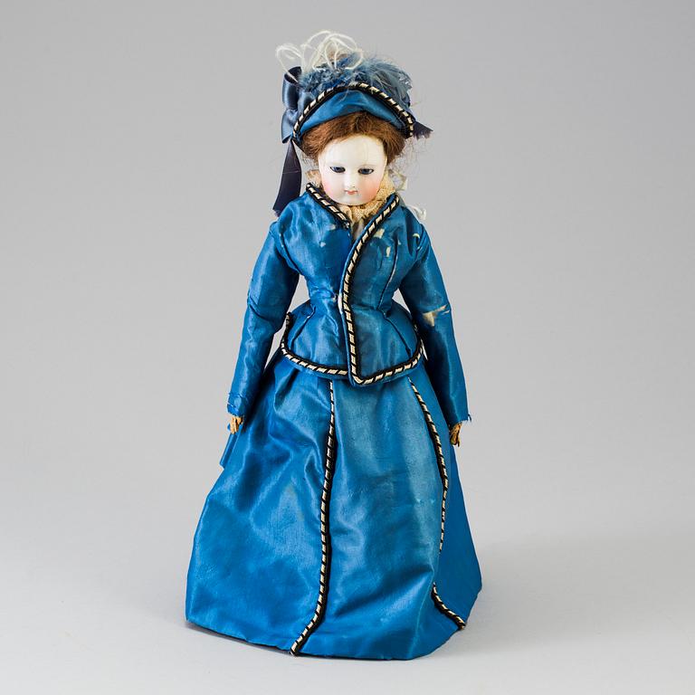 A bisque head fashion doll, probably France, late 19th century.