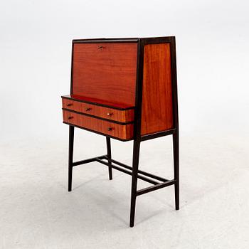 A 1950s mahogany writing desk.