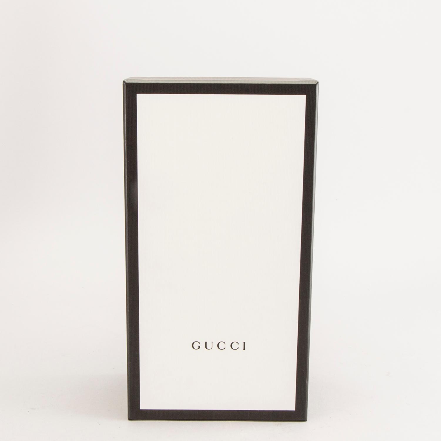 Gucci,.
