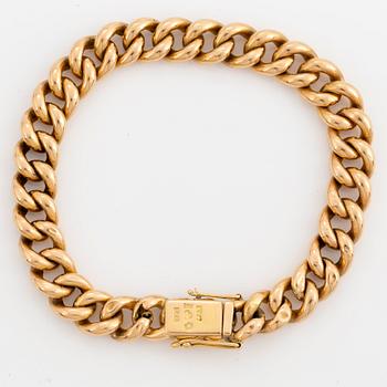 18K gold bracelet.