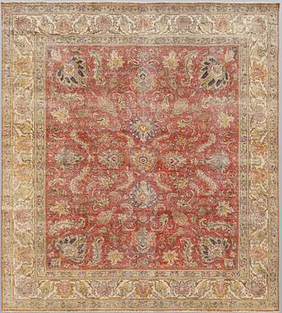 An oriental 'vintage' carpet, c 320 x 295 cm.