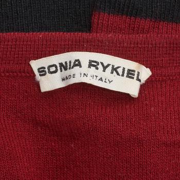 SONIA RYKIEL, a burgundy red sweater and skirt.