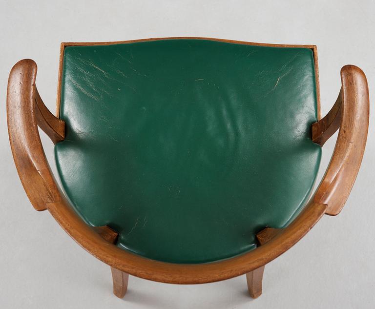 Alfred Grenander, a mahogany and green leather armchair, ca 1905.