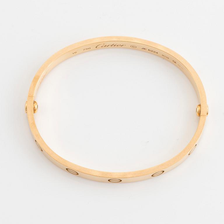 A Cartier "Love" bracelet in 18K gold.