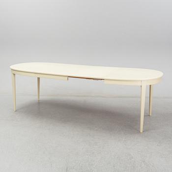 A dining table with six chairs by Carl Malmsten. Second half of the 20th Century.