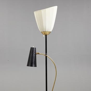 A Swedish Modern brass and black lacquered floor lamp, 1950's.