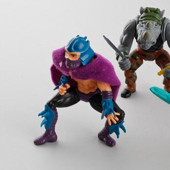 16 Teenage Mutant Ninja Turtles toys from Playmates toys, 1980s and 1990s.