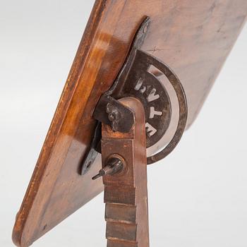 A reading table, J. Carter London, England, circa 1900.