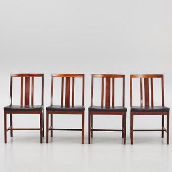 Bertil Fridhagen, a rosewood-veneered dining table with four chairs, BOdsfors, Sweden, 1960's.