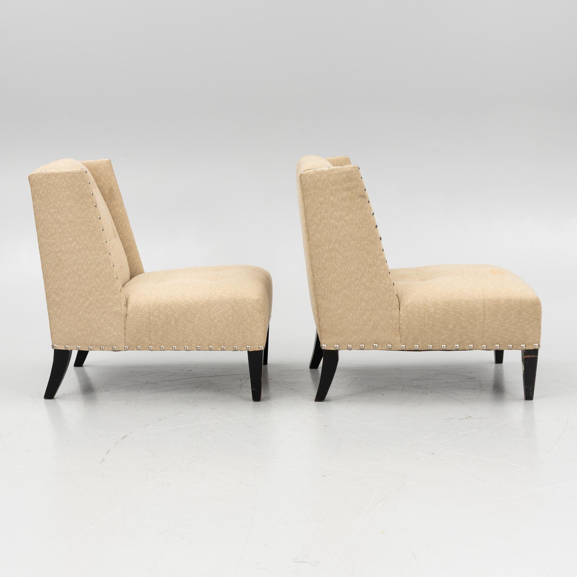 A pair of 'Triton custom chair' lounge chairs, Andrew & Martin, England, 21st century.