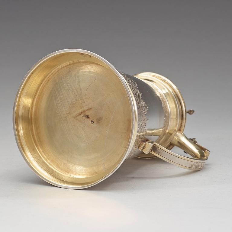 A Russian 19th century parcel-gilt tankard, unidentified makers mark, Moscow 1884.