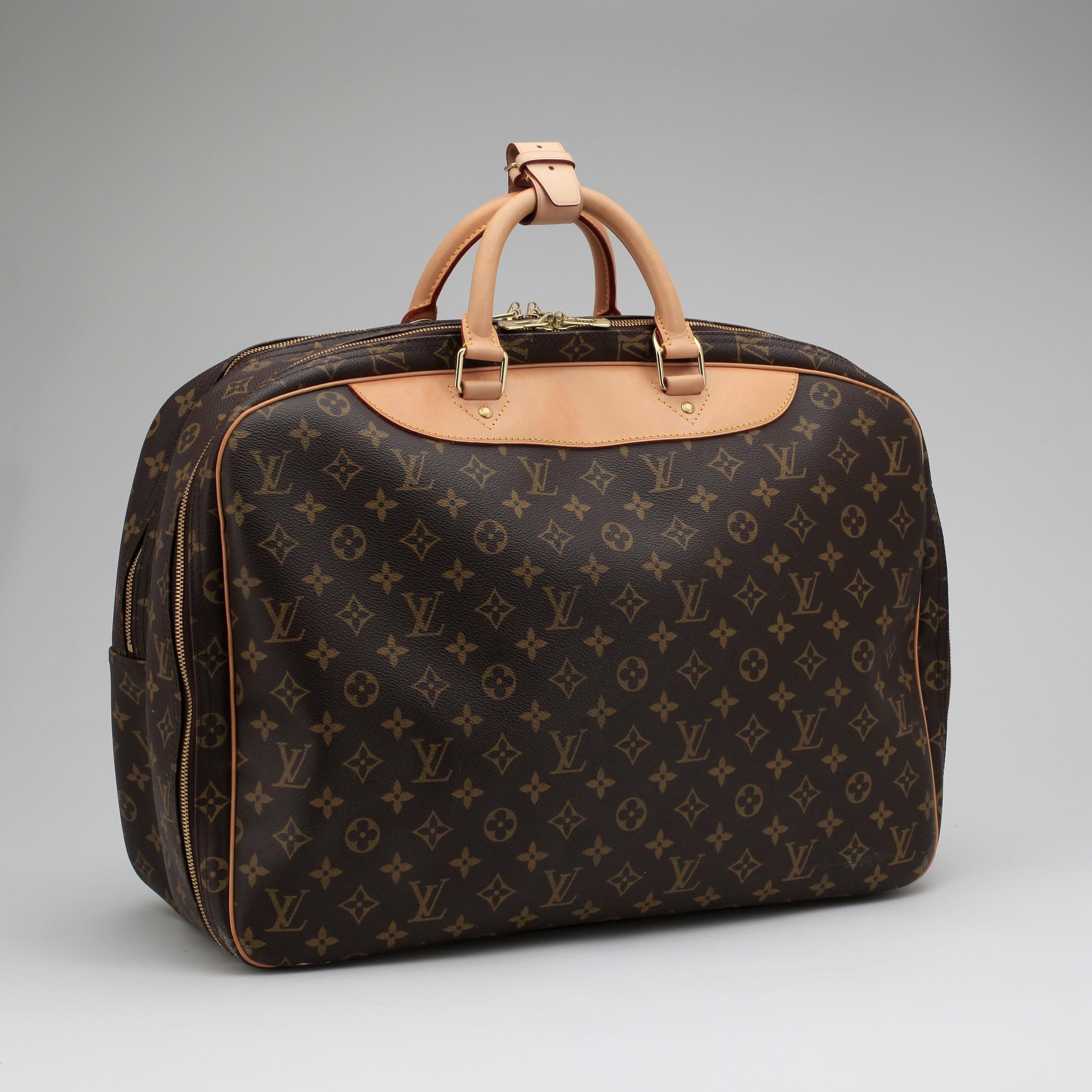LOUIS VUITTON, a Monogram canvas "Alizé 24 heures" weekend bag.