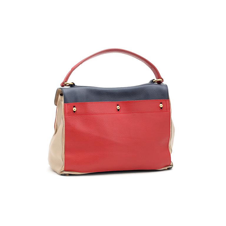 YVES SAINT LAURENT, a beige, red and blue leather handbag, "Muse two".