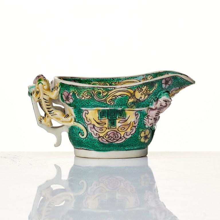 A famille verte bisquit libation cup, Qing dynasty, Kangxi (1662-1722).