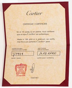Cartier, A "Trinity" bracelet made of 18K white gold, ceramic and textile. Marked Cartier, JZY979.