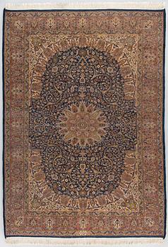 A signed rug, oriental, ca. 242 x 168 cm.