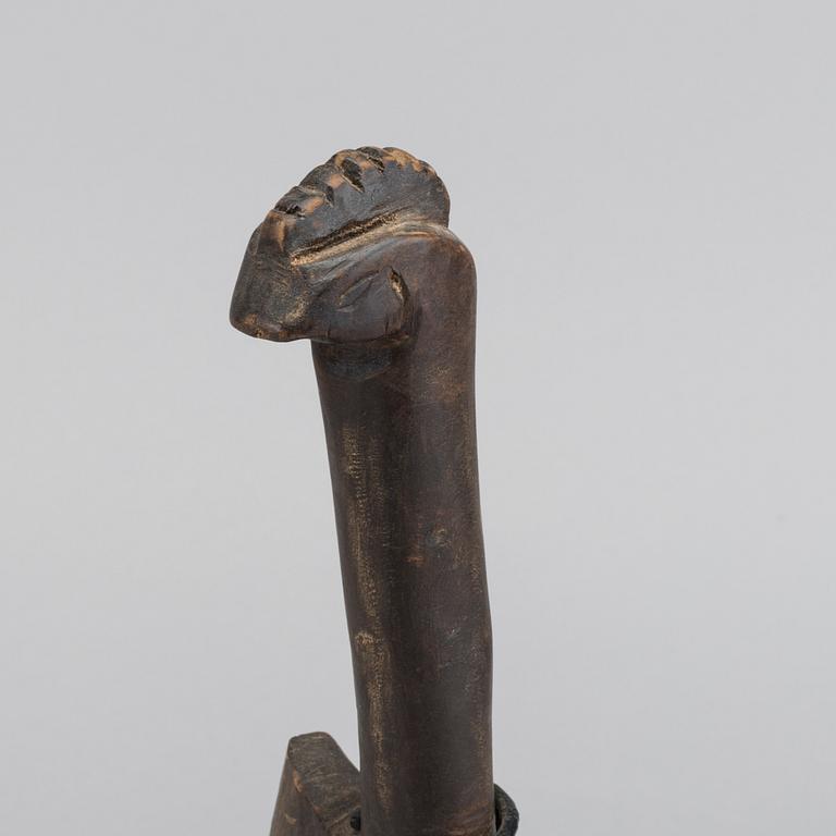Spoon from the Senufo people of the Ivory Coast.