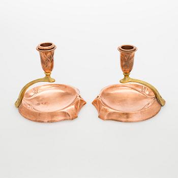 A pair of early 20th century WMF (Württembergische Metallwarenfabrik), candlesticks.