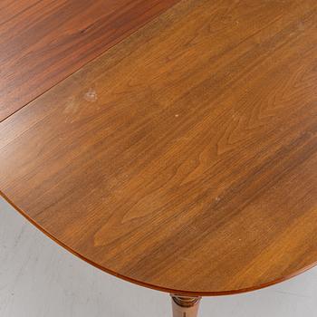 A Gustavian style dining table with two armchairs and four chairs, late 20th century.
