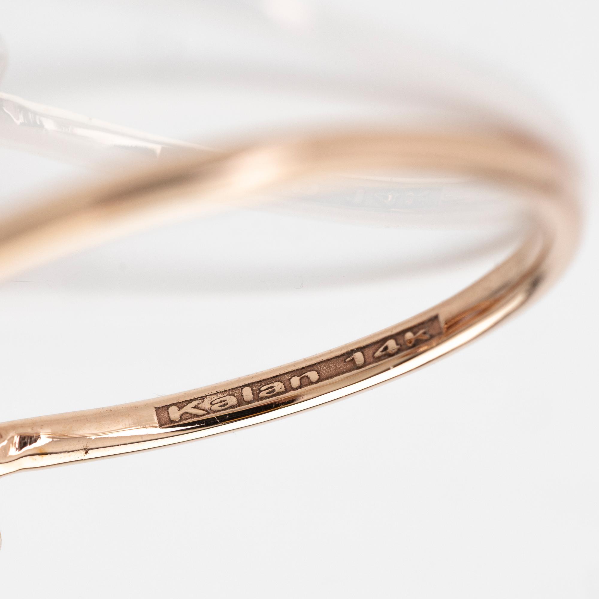 Suzanne Kalan, 14K gold ring with sapphires and diamonds.