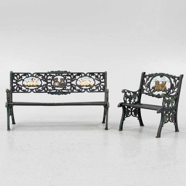A children's cast iron garden sofa and armchair, mid 20th century.