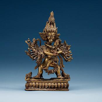 463. A Tibetian bronze figure, 19th Century.
