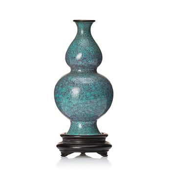 1087. A Chinese double gourd 'robins egg' vase, Qing dynasty, 19th century.