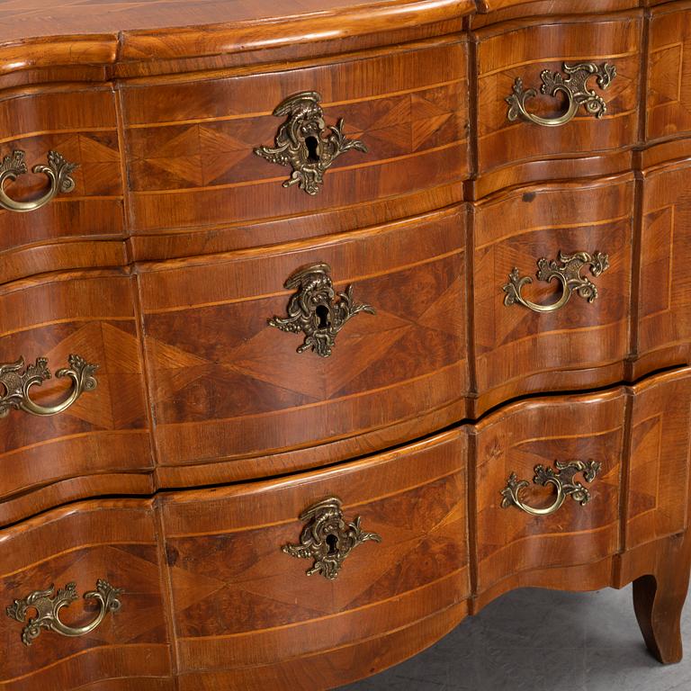 A Northern-European late baroque chest of drawers, mid 18th century.