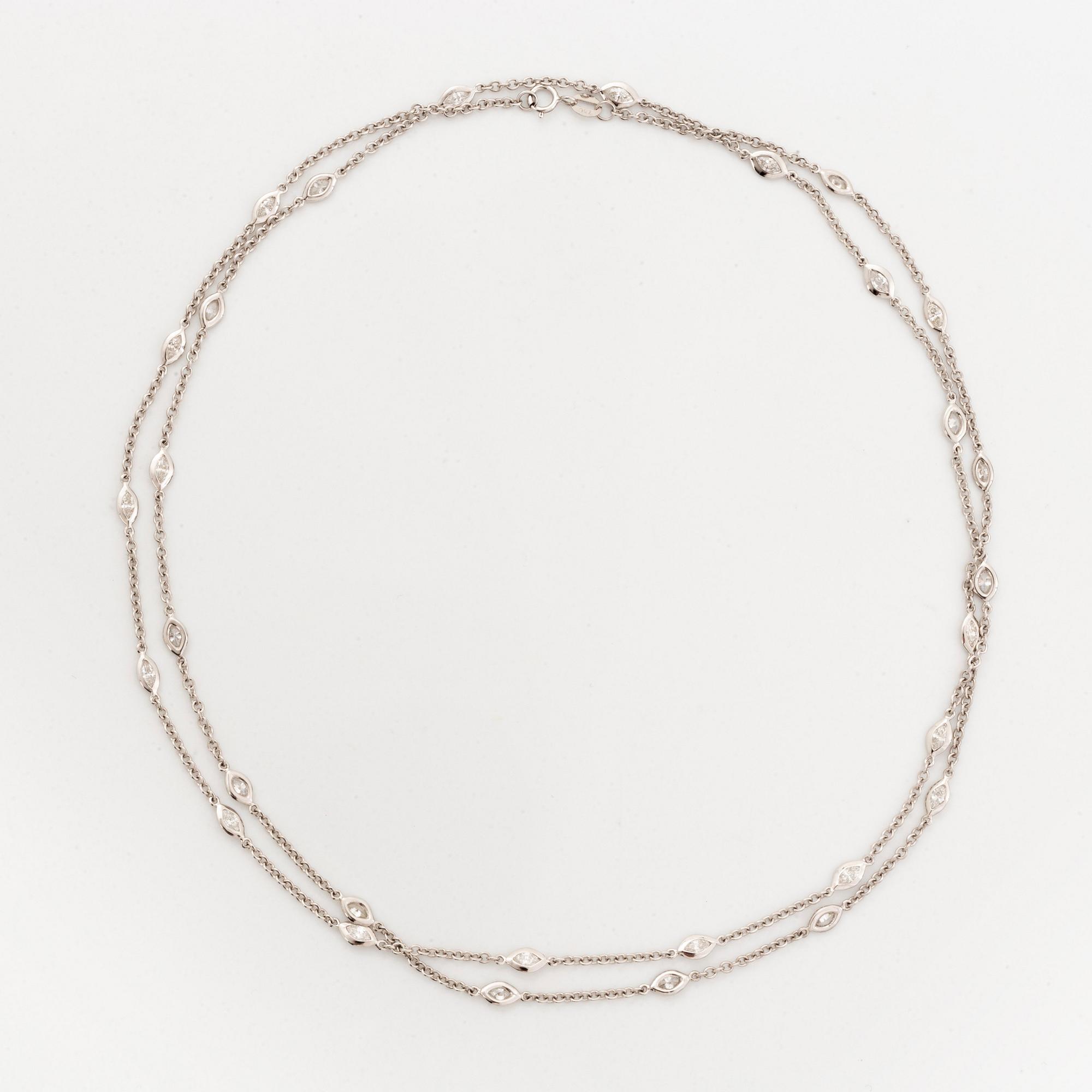 Collier 18K vitguld med markisformade briljantslipade diamanter.
