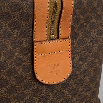 a CÉLINE "Macadam Boston 50" weekendbag.