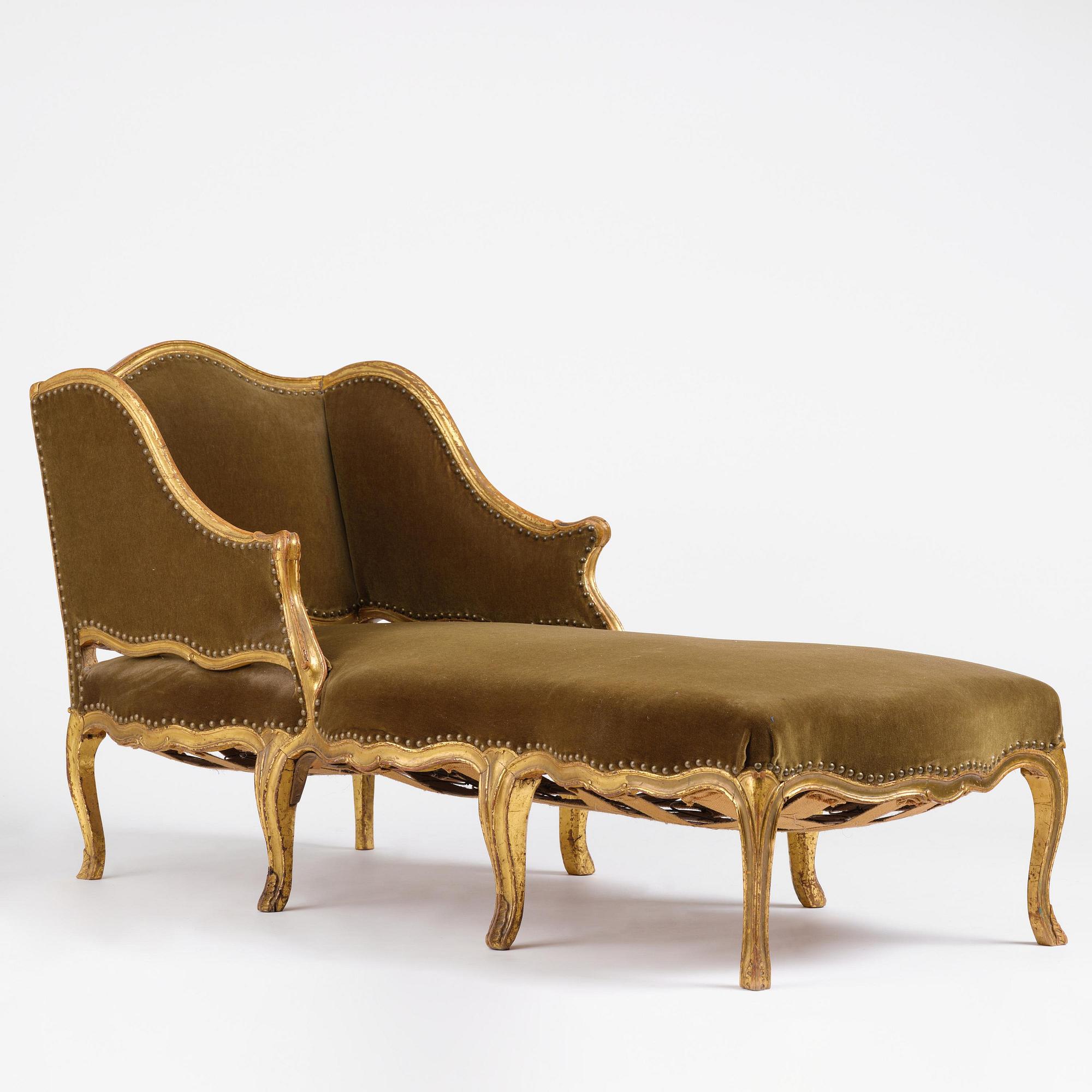 A French Louis Xv giltwood lit de repos, later part 18th century.
