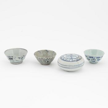 A Chinese blue and white box with cover, Ming dynasty, 17th century and three bowls, Southeast Asia, 19th/20th century.