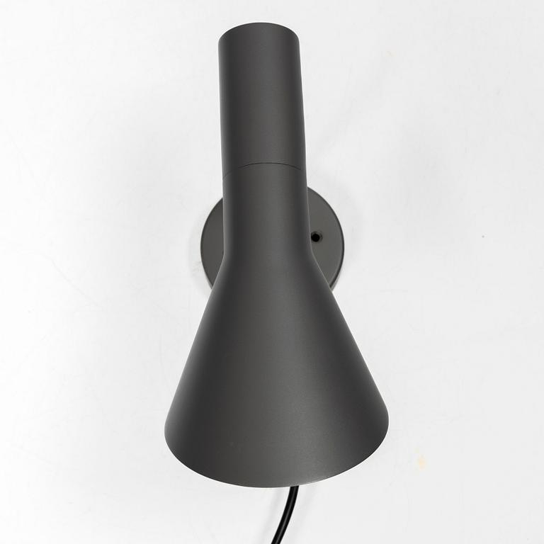 Arne Jacobsen, An 'AJ' wall lamp, Louis Poulsen. 21st century.