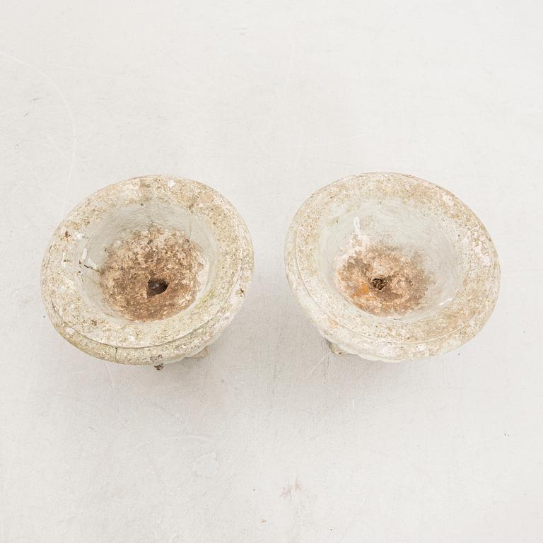A pair of 20th century concrete garden urns.