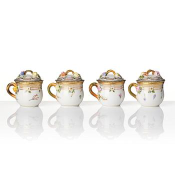 A set with four Royal Copenhagen 'Flora Danica' custard cups with covers and stands, Denmark, 20th century.