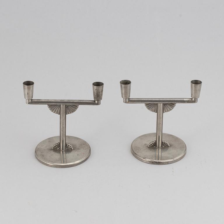 A pair of 1935 pewter candelabras by K E & Co.