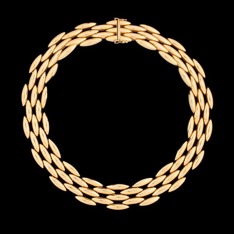A Cartier gold necklace.