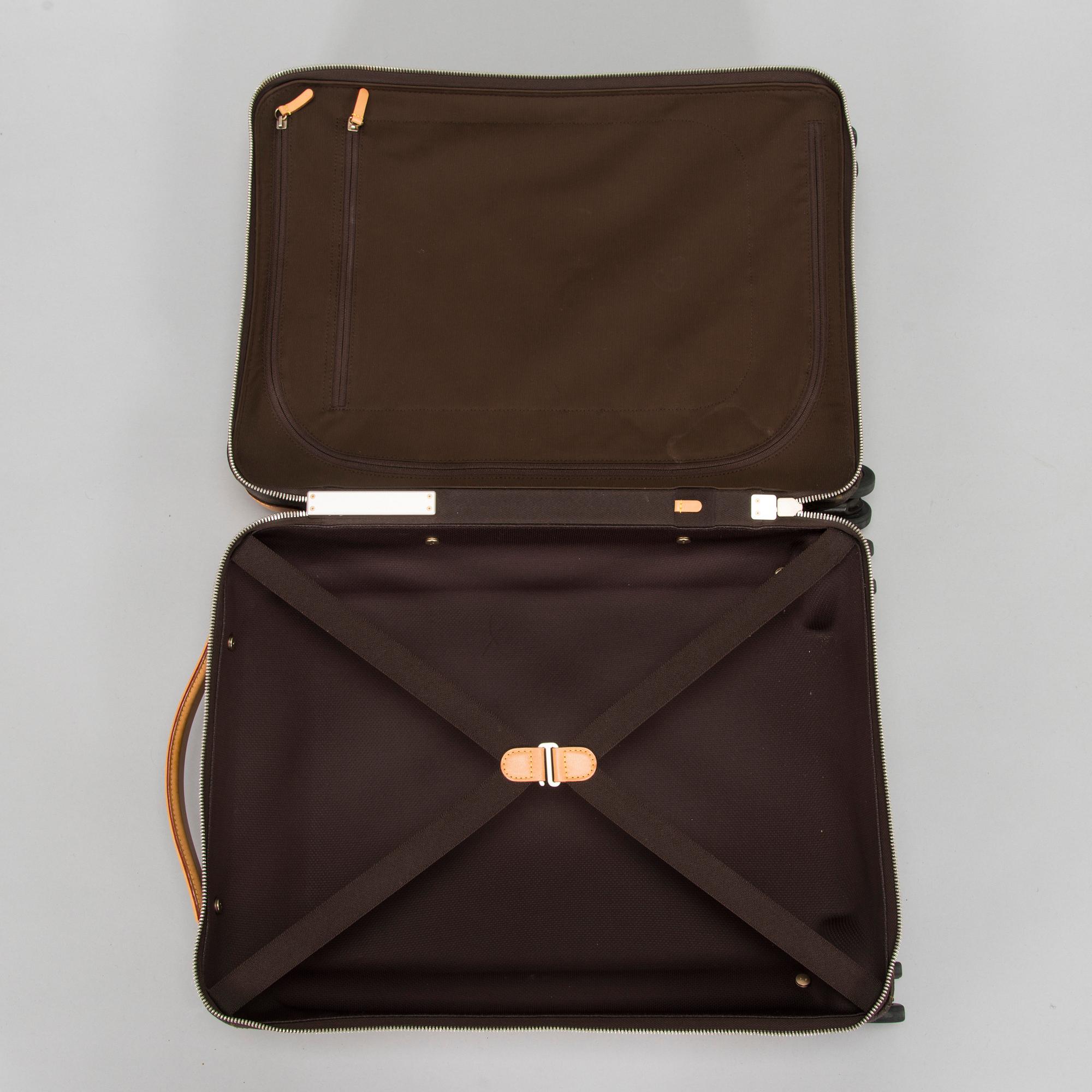 Louis Vuitton,  a 'Horizon 50' carry-on luggage bag.