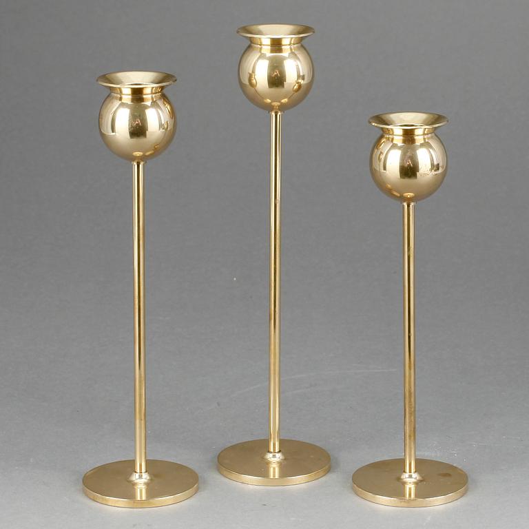 LJUSSTAKAR, 3 st, mässing, "Tulpan", Pierre Forsell, Skultuna, 1900-talets andra hälft.