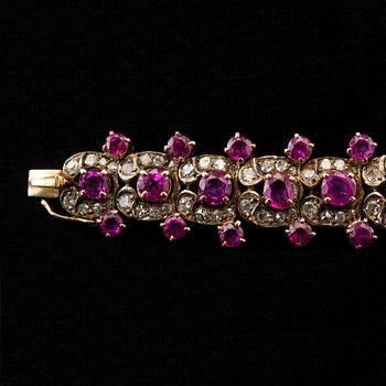 A BRACELET, 132 8/8 cut diamonds c. 2.64 ct. 66 rubies c. 15.80 ct. Weight 35,3 g.