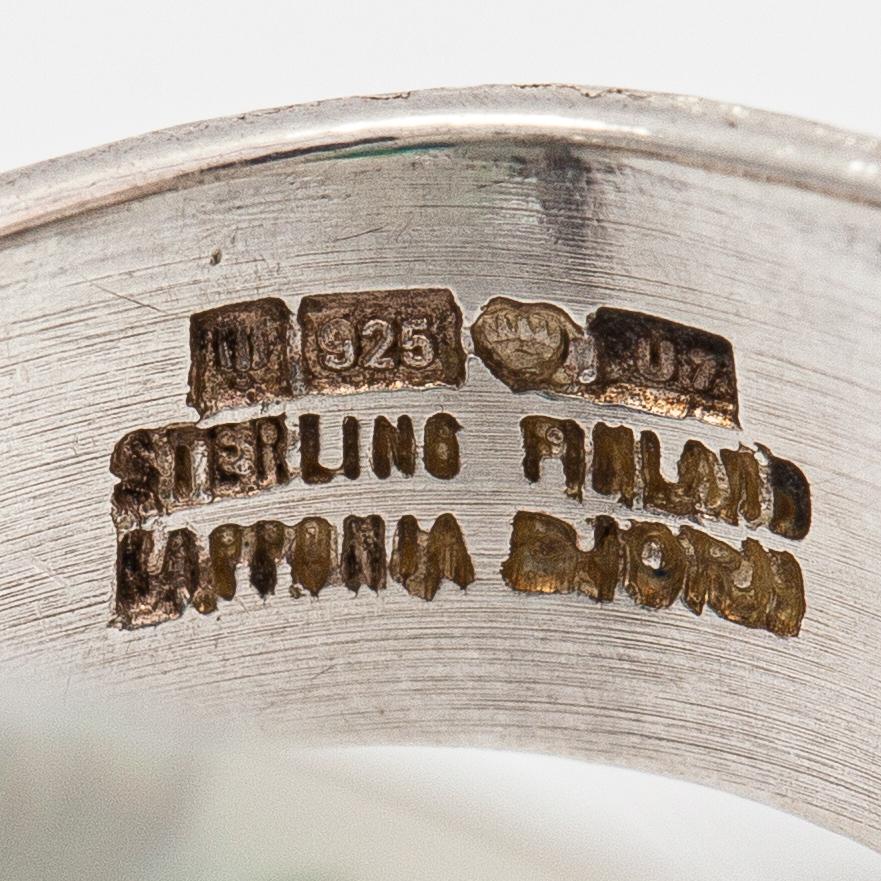 Björn Weckström, "Petrified lake", a sterling silver and acrylic ring. Lapponia 1973.