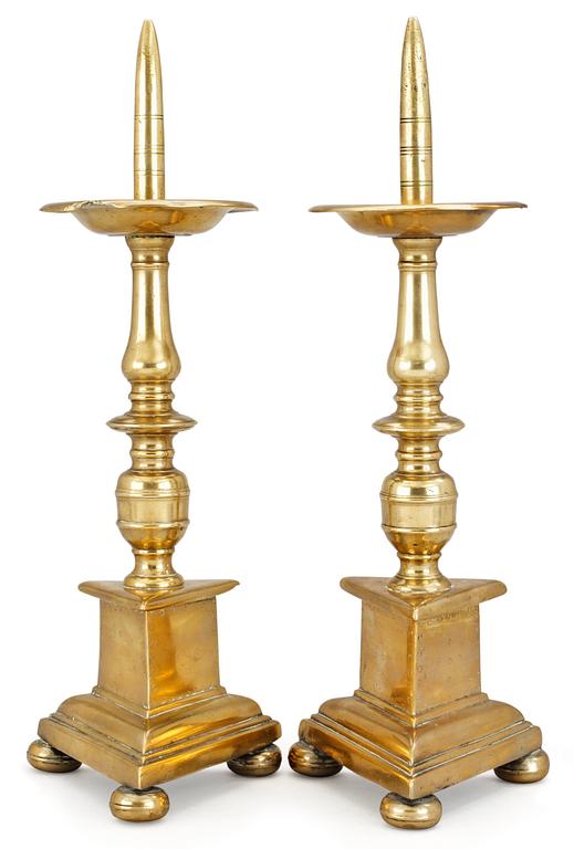 A pair of Baroque altar candlesticks.
