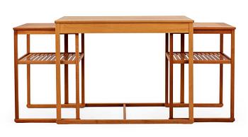 96. A Carl Malmsten teak set of occasional tables.