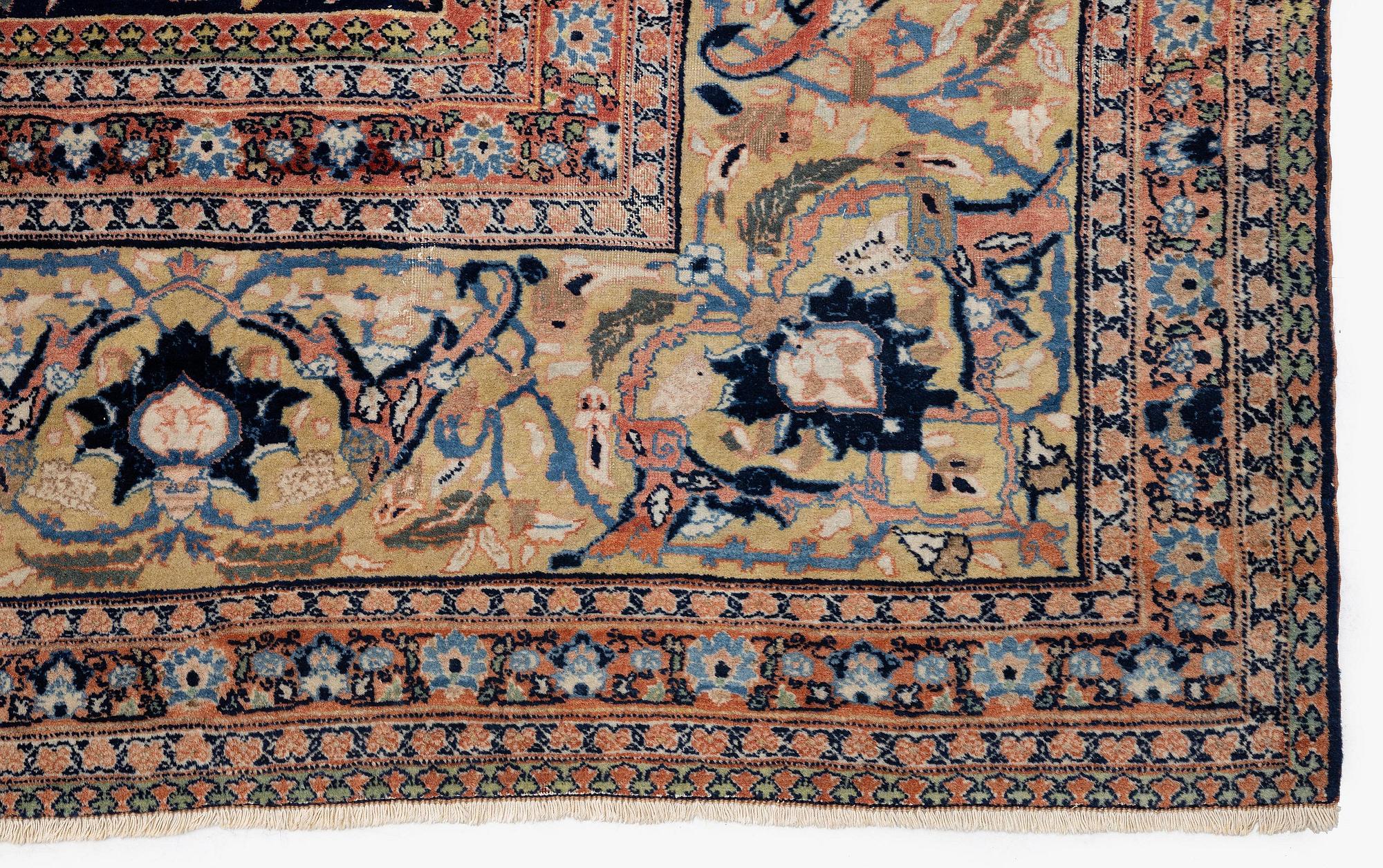An antique Tabriz carpet, Northwest Persia (Iran), c. 495 x 403 cm.