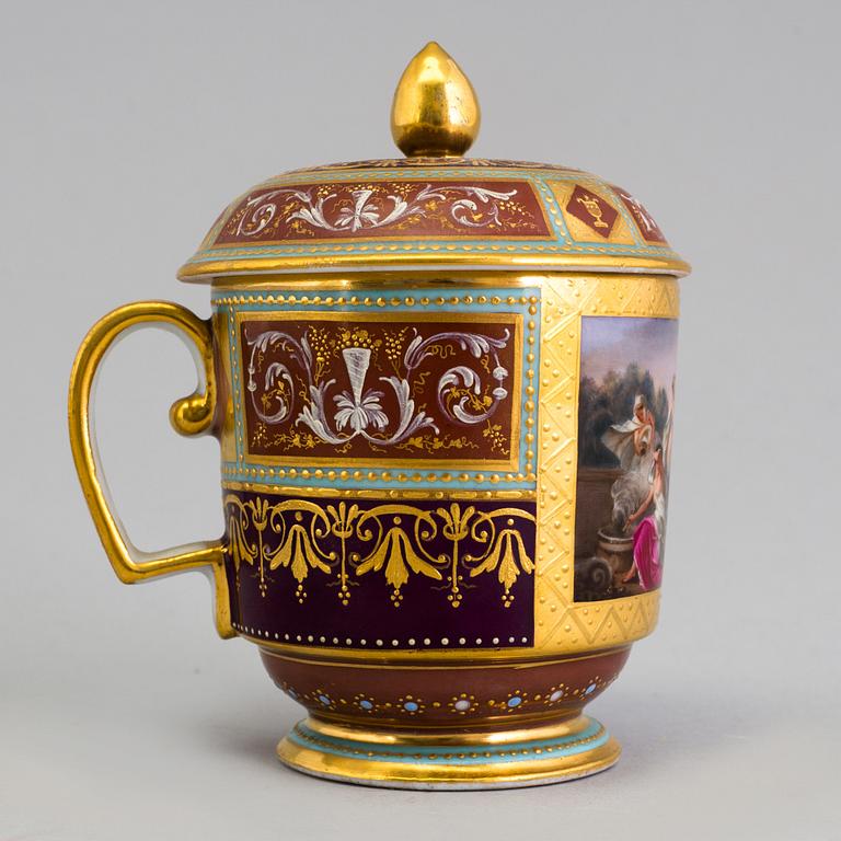 An early 19th century empire cup with saucer and cover with Wien mark.