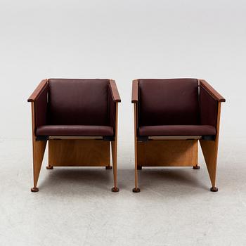 Torbjörn Ahlström, a pair of mahogany and cherry armchairs.