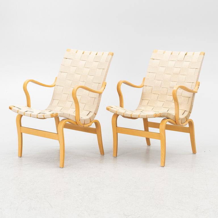 Bruno Mathsson, a pair of 'Eva' armchairs, DUX, Sweden, second half of the 20th century.