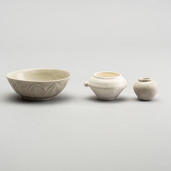 A group of white glazed South East Asian vases and bowls, partly 16/17th Century.