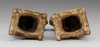 A pair of green and yellow glazed dogs, late Ming dynasty (1368-1644). (2).