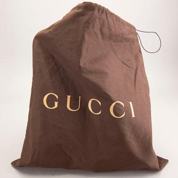 Gucci,